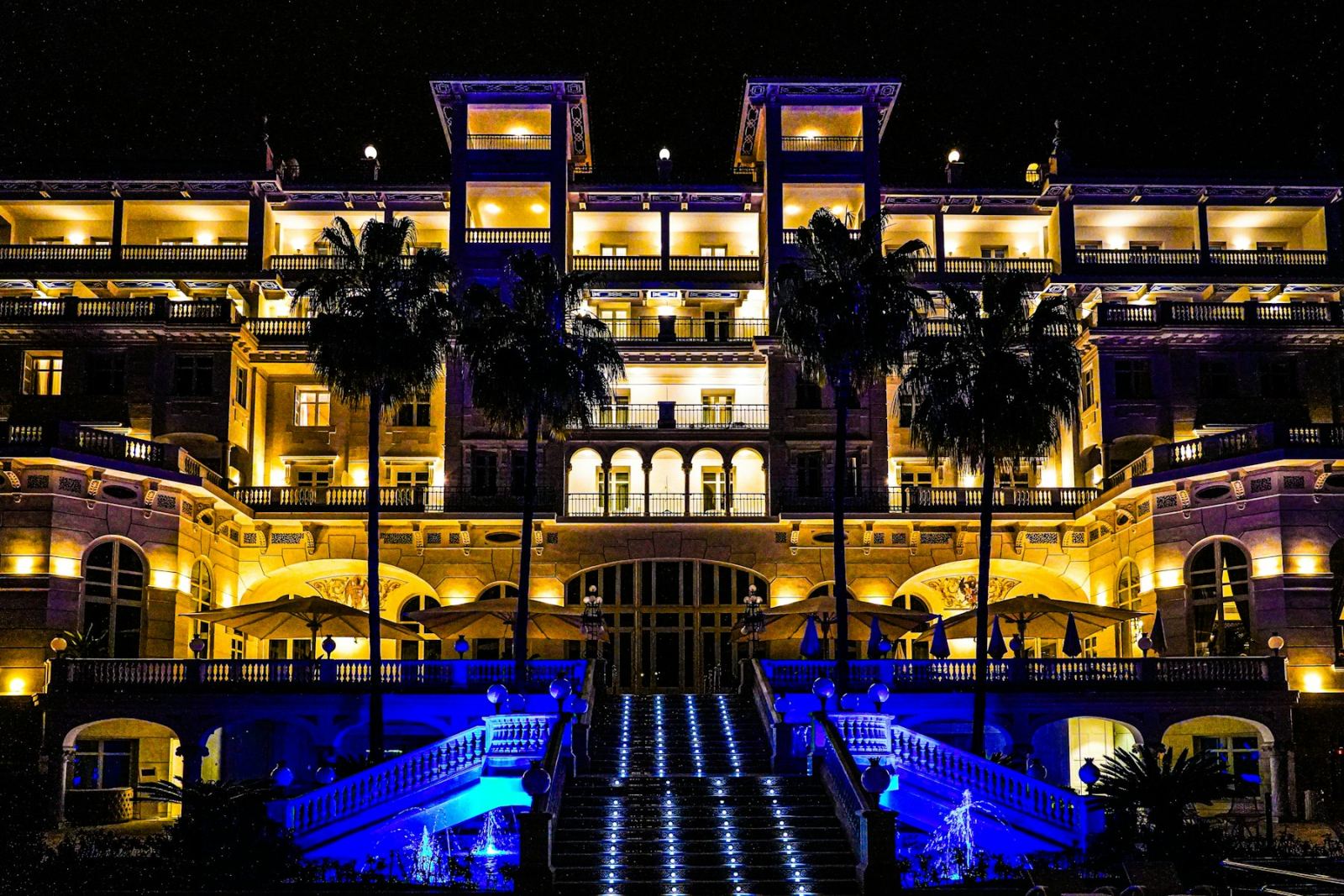 The hotel lit up at night